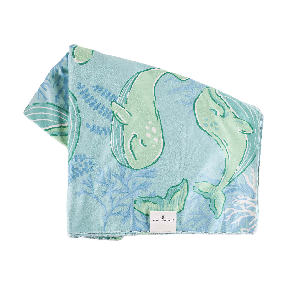 Simply Southern Quick Dry Towel in Whale Print features a colorful underwater scene with whimsical whales and sea turtles in shades of blue, green, and white.  Measuring 40&quot;x 72&quot; this towel offers quick dry convenience while keeping you in style!