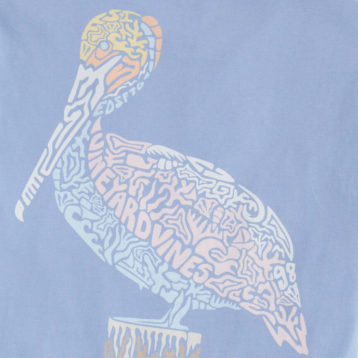Close-up of the Vineyard Vines icon logo filled with a colorful pelican print, printed on soft, faded blue cotton fabric.
