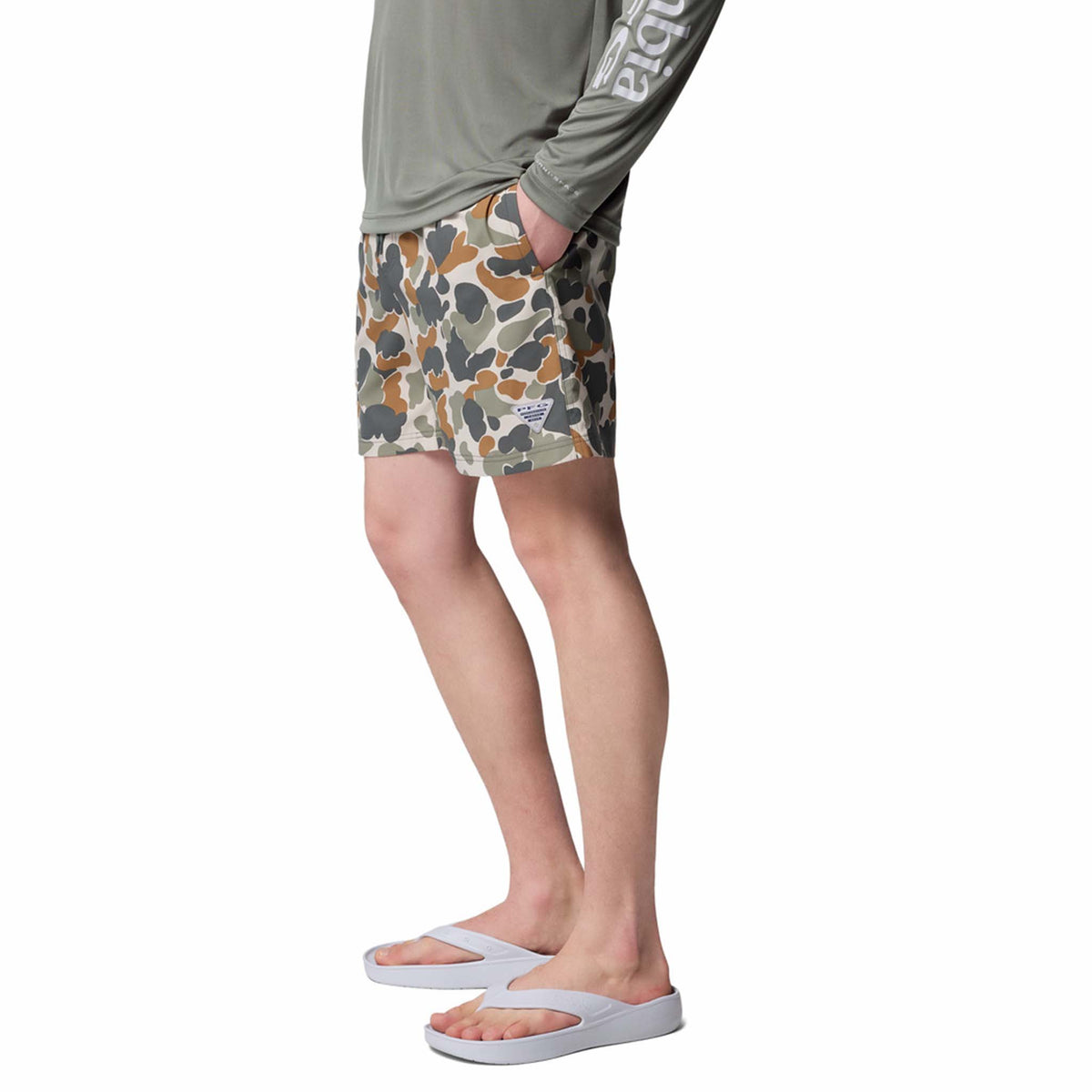 Side view - Columbia Sportswear 6&quot; Printed Rambler Men&#39;s swim trunks, color green, tan, brown camo.  Featuring Omni-Shade™ UPF 50 these shorts guard against skin damage. Created for all-day comfort and breathability using fast dry fabric.  Zippered back security pocket and Hand pockets for small items for small items.