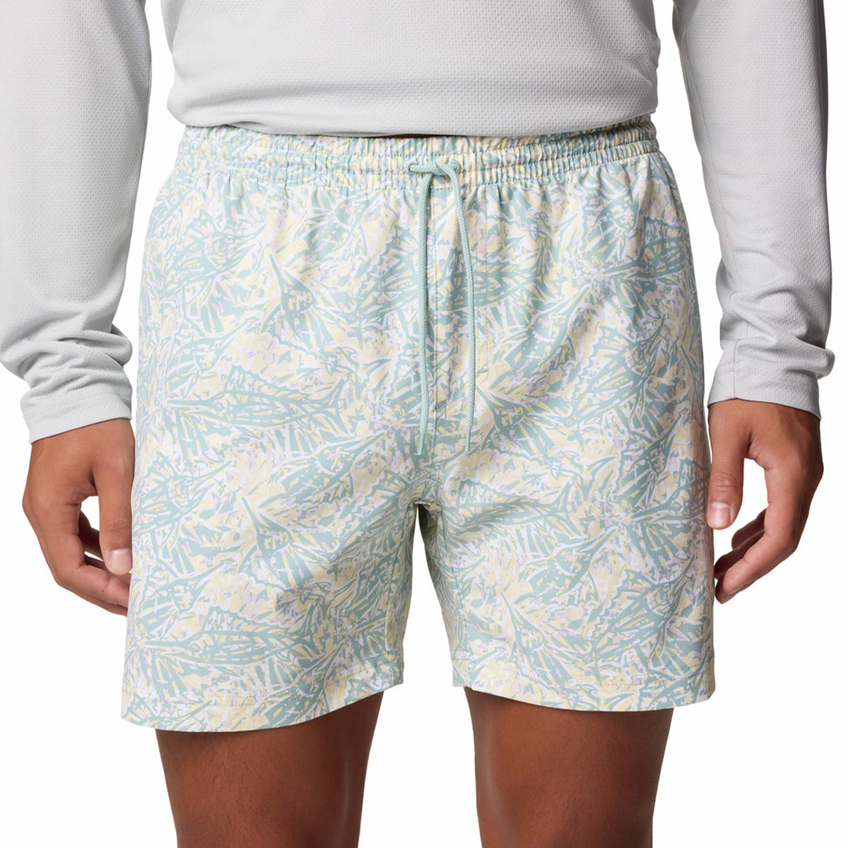 Close Up of Front view - Columbia Sportswear 6&quot; Printed Rambler Men&#39;s swim trunks, marlin print in colors aqua blue and yellow.  Adjustable elastic waistband with drawstring cord to customize fit. Featuring Omni-Shade™ UPF 50 these shorts guard against skin damage. Created for all-day comfort and breathability using fast dry fabric.