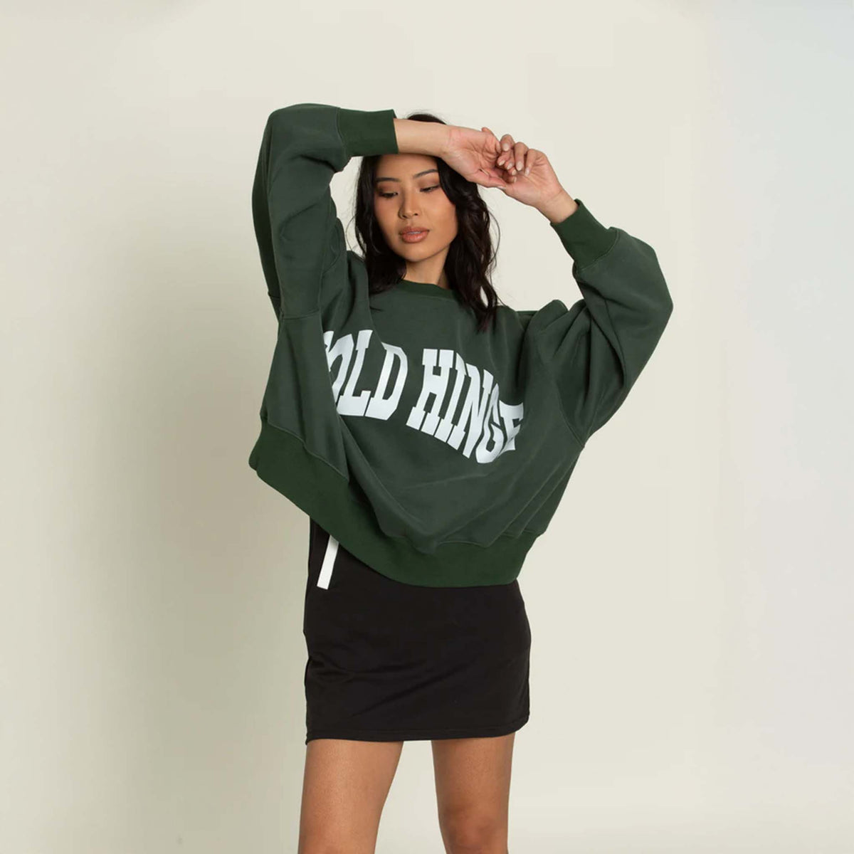 Front view of the Gold Hinge oversized crewneck sweatshirt featuring a relaxed fit, dropped shoulders, and ribbed cuffs and hem. Made from soft, heavyweight fabric for a cozy, casual look.