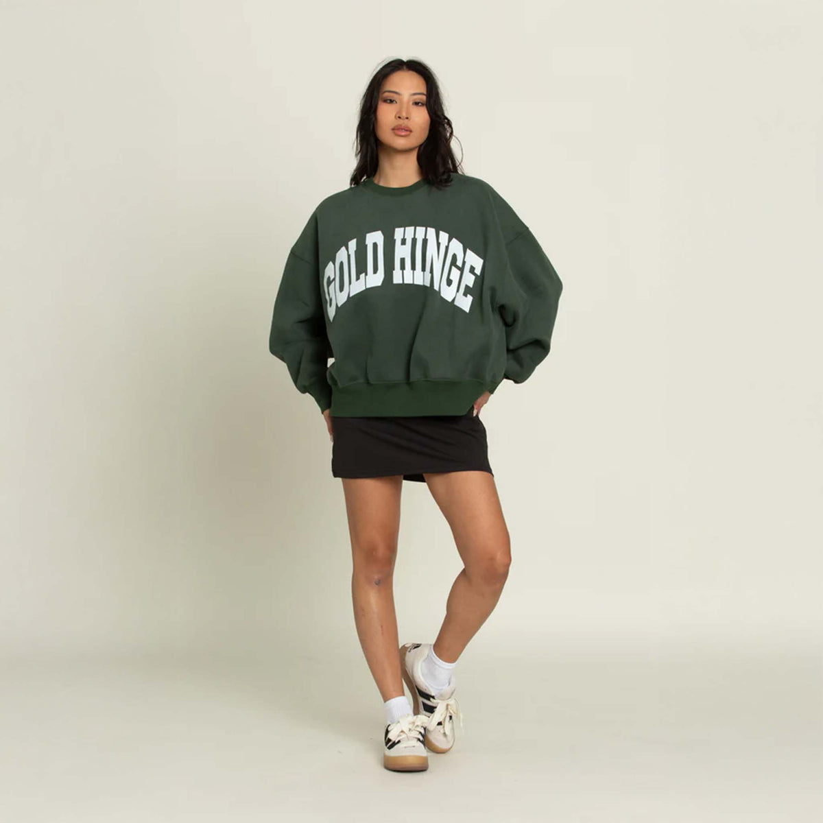 Front view of the Gold Hinge oversized crewneck sweatshirt featuring a relaxed fit, dropped shoulders, and ribbed cuffs and hem. Made from soft, heavyweight fabric for a cozy, casual look.