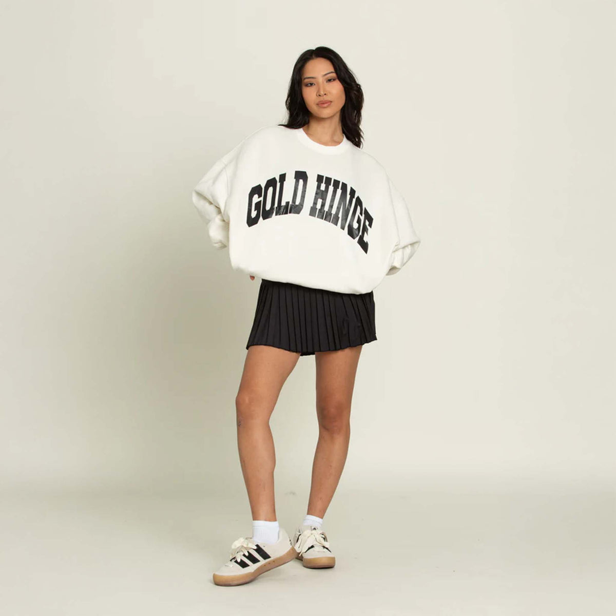 Front view of the Gold Hinge oversized crewneck sweatshirt featuring a relaxed fit, dropped shoulders, and ribbed cuffs and hem. Made from soft, heavyweight fabric for a cozy, casual look.
