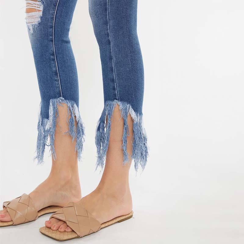 Zoomed in view of ankle of Kancan The Leslie Mid Rise Ankle Skinny Jeans