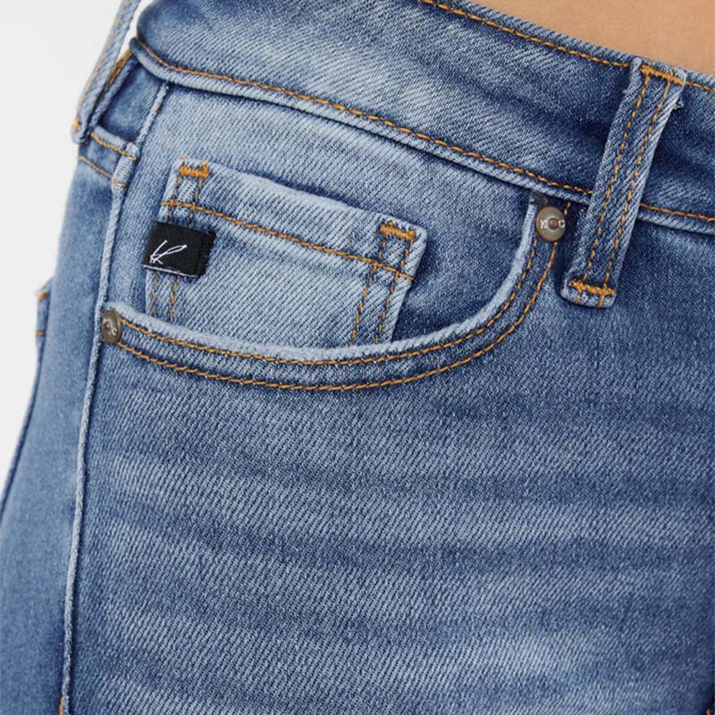 Up close view of pocket of Kancan The Leslie Mid Rise Ankle Skinny Jeans