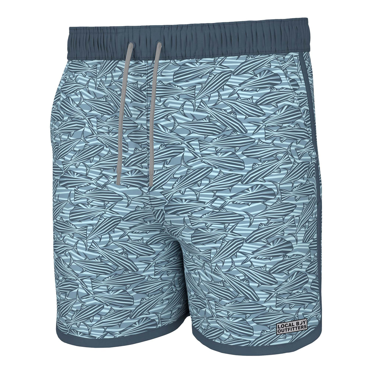 Front view - Local Boy Outfitters Wando swim trunks, color Impressions, Sizes S-XXL, 95% Nylon, 5% Elastane.  The Impressions pattern has shades of blue creating a geometric tropical fish pattern.  These trunks feature a mesh liner, Elastic waistband with drawstring, two side pockets, and one back pocket with snap button closure. There is a small Local Boy Outfitters logo on the bottom left pant leg.