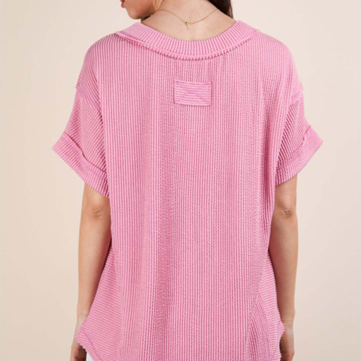 Back view of a woman wearing the Very J Ribbed V-Neck Short Sleeve Knit Top, color Pink, sizes S-L.
A versatile essential, this short-sleeve top features a soft ribbed knit fabric and a flattering V-neckline. Easy to dress up or down, it’s the perfect go-to for effortless everyday style!
Soft Two Tone Casual Comfy Ribbed Knit Top
V-Neck
Short Sleeve
Raw Edge Detail