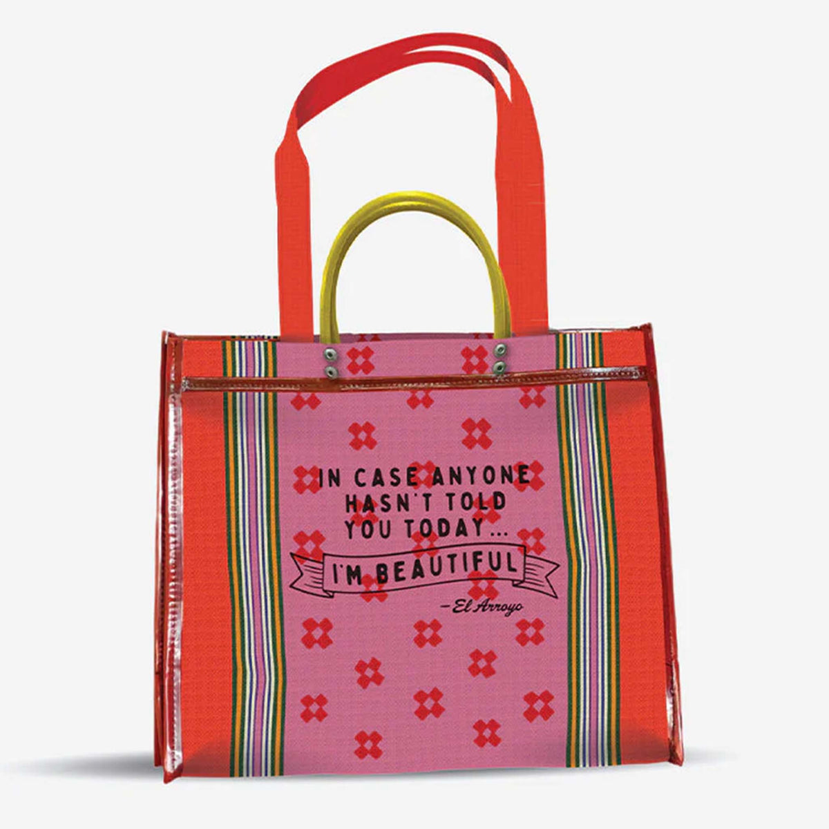 El Arroyo XL Mesh Tote - color pink, dark color text and multicolored stripes.  This bag has shoulder straps as well as smaller handle straps to be carried by hand or over the shoulder.
Featuring the phrase &quot;In Case No One Told You Today - I&#39;m Beautiful&quot;, this tote brings humor and confidence to your summer outings!
Dimensions: 23” L x 4.75” W x 19.75” H
100% polyethylene mesh
Made in Mexico